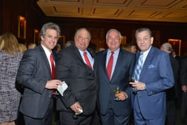 John Catsimatidis with three guests